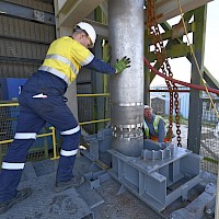 The submersible pump being lowered into NCK shaft